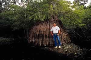 Jerry McCollum in front of an ancient cypress in Ebenezer Creek near the Georgia Coast. The protection of Georgia's special natural areas has been a major goal of his. Photo by Richard T. Bryant. Email richard_t_bryant@mindspring.com.