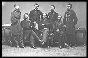 "Sherman and His Generals," a photograph by George N. Barnard. Standing from left to right are Oliver Howard, William Hazen, Jefferson C. Davis, and Joseph Mower. Seated from left to right are John Logan, W.T. Sherman, and Henry Slocum.