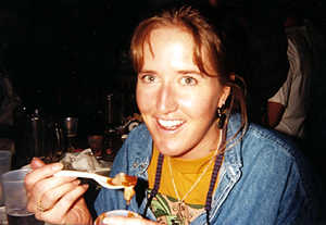 Kerry eating an oyster, April 26, 1997 at the Acme Oyster Bar, New Orleans, LA during the Jazzfest