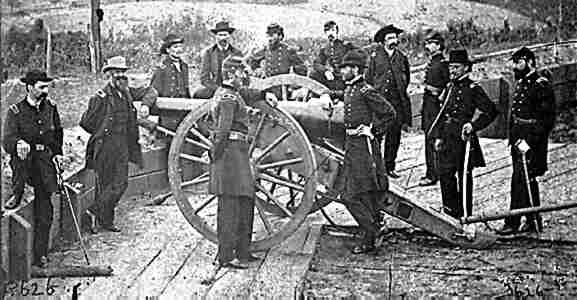 Sherman leans on cannon at Federal Fort No. 2, George N. Barnard, 1864.