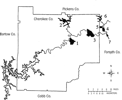 Figure 16. Locations of existing and future major threats to the Etowah River system centered around Cherokee County (boundary shown): 1 = active landfill; 2 = proposed water-supply impoundment on Sharp Mountain Creek; 3 = proposed golf course and housing development; 4 = proposed private landfill; 5 = Forsyth County landfill; 6 = proposed Yellow Creek water-supply reservoir; 7 = proposed site of water release of secondary-treated sewage from the Chattahoochee River watershed.