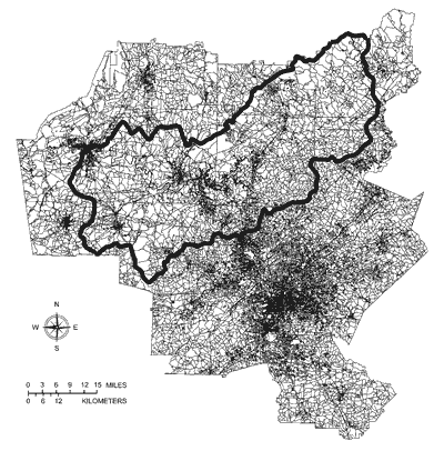 Figure 6. Centers of human population density within the Etowah River watershed taken from 1990 census data. Population centers are: at mouth of river - Rome; north side of river downstream from Allatoona Dam - Cartersville; huge center south of river - Atlanta; on south side of river upstream from Allatoona Reservoir - Canton. Bold perimeter line is the Etowah watershed boundary; bold line within the perimeter is the main channel of the Etowah River and Allatoona Reservoir.